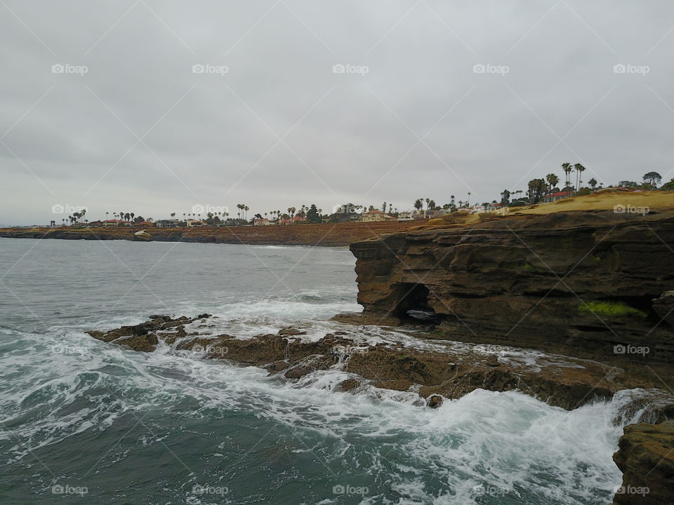 https://en.m.wikipedia.org/wiki/List_of_beaches_in_San_Diego
This is a list of beaches in the San Diego area in Southern California, USA. This article actually contains two sequential lists: a list of beaches in San Diego's North County, and a list of beaches that are within the city limits of San Diego. The beaches are listed in order from north to south, and they are grouped (where applicable) by the community in which the beach is situated.

Some beaches in the San Diego area are long continuous stretches of sandy coastline, others, like many of the beaches in the Village of La Jolla (which was built on a large rocky promontory), are small sand beaches within rocky coves or between rocky points. A number of beaches in the San Diego area have cliffs behind them, usually composed of rather soft sandstone; some other beaches front freshwater lagoons where rivers run into the coast.