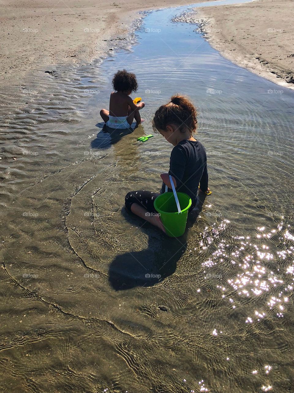 Children playing tide pool 