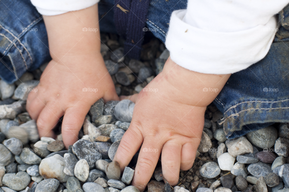 jeans child hands stones by IndianPink
