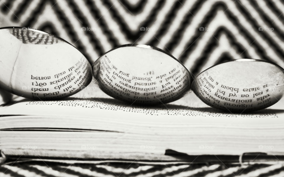 Book reflected in the spoon