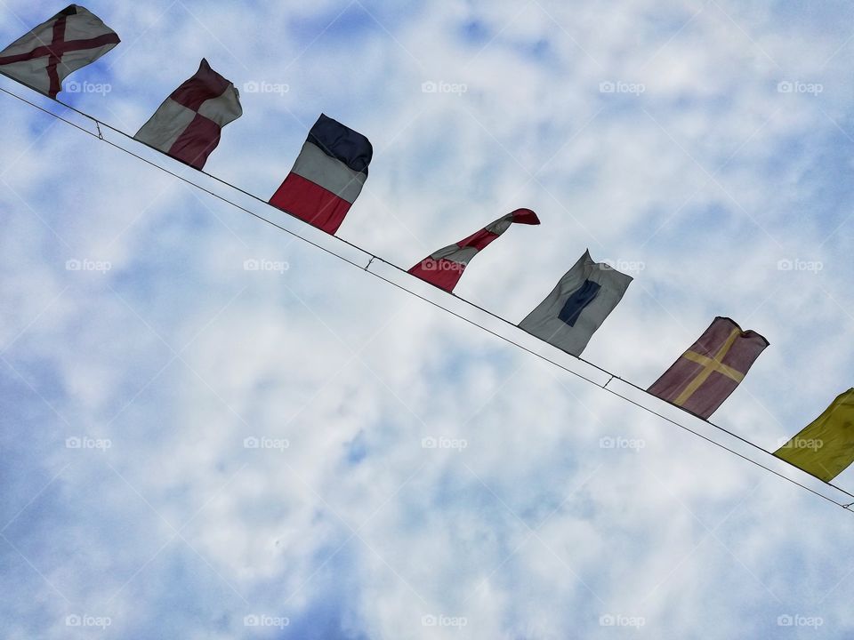 hanging flags flutter in the air