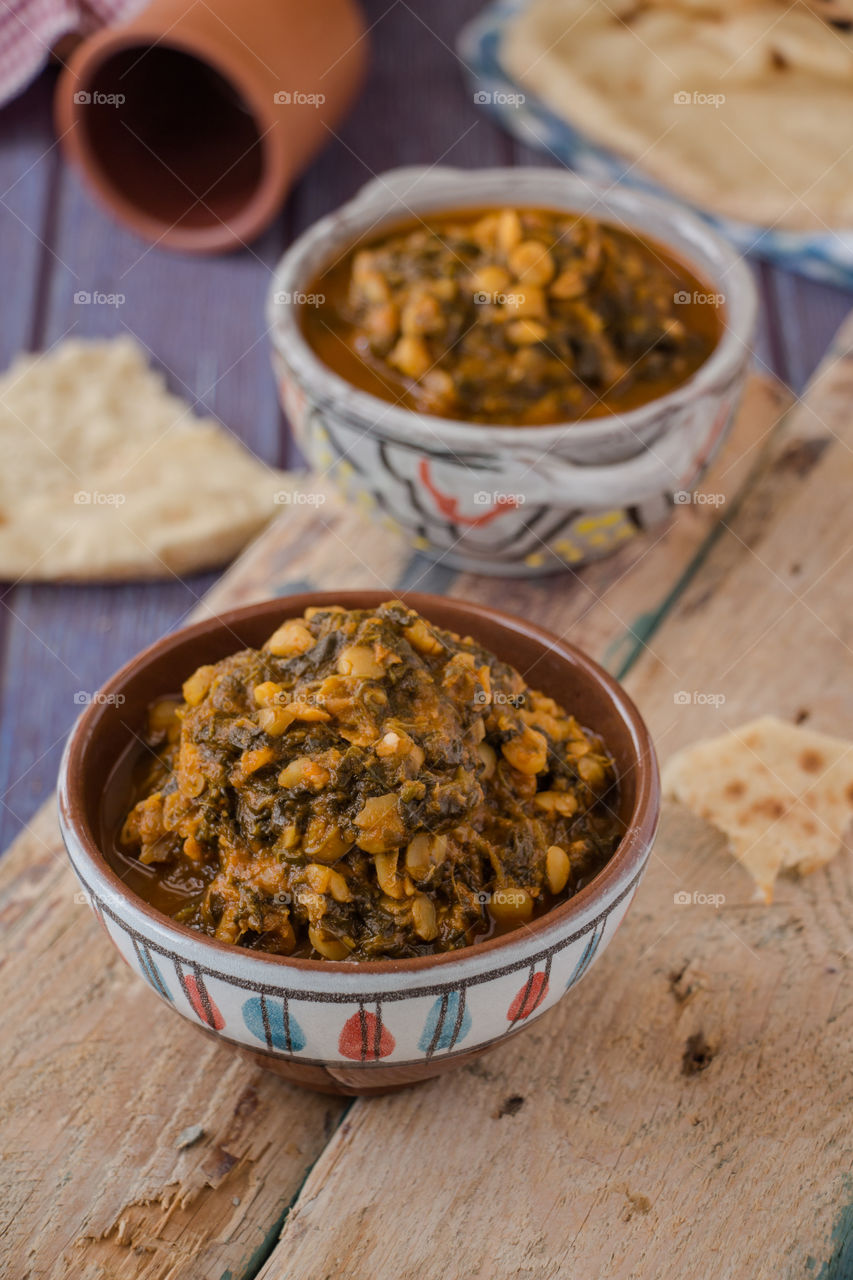 Cooked spinach with humus