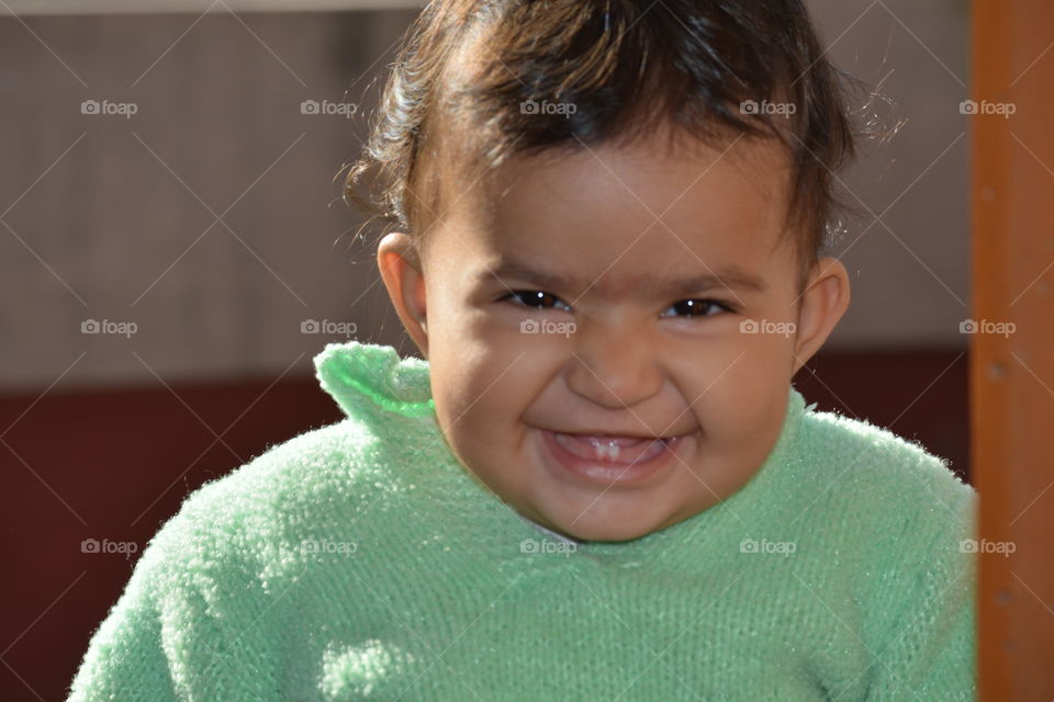 Close-up of cute smiling asia girl
