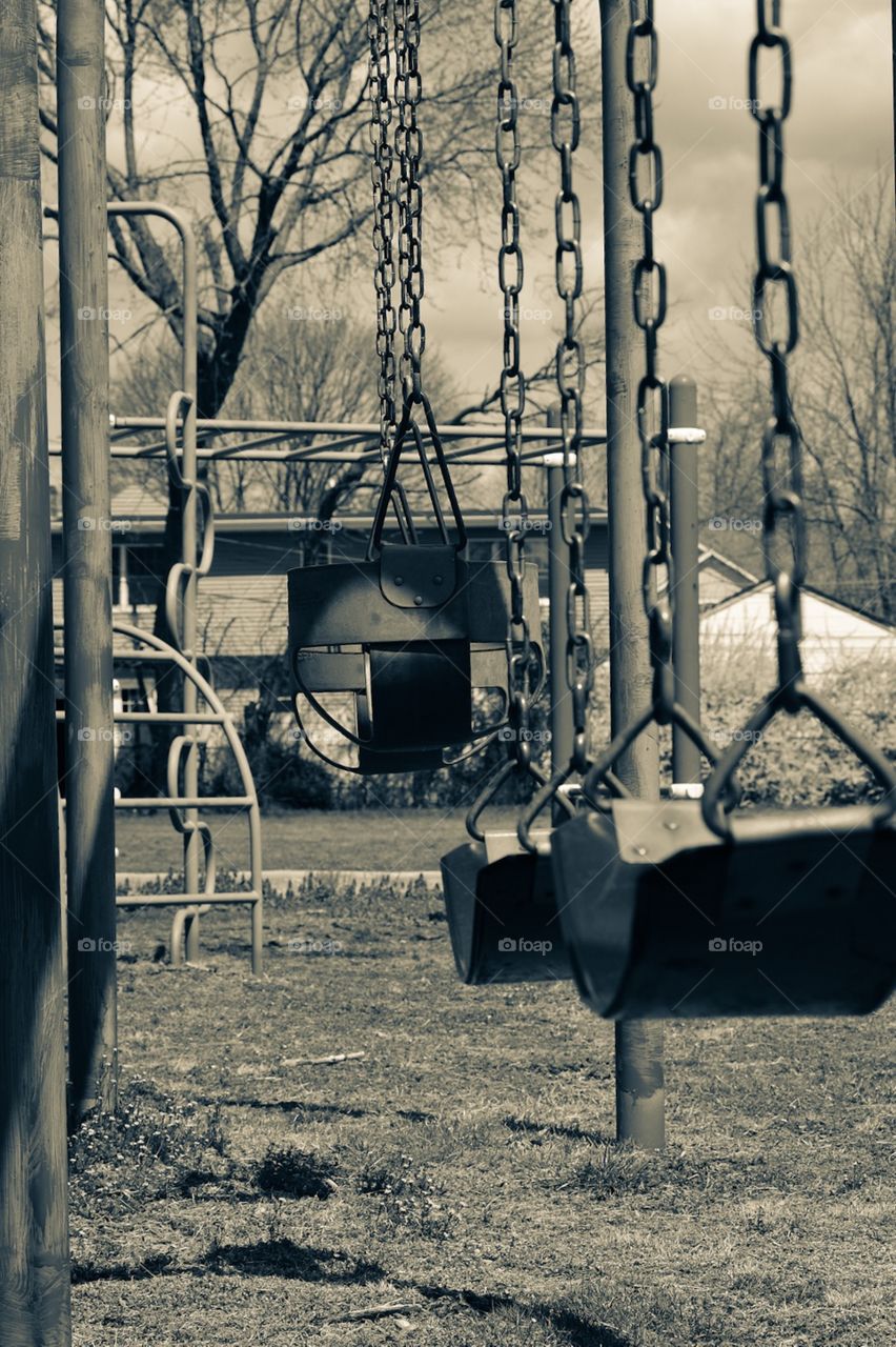 Monochromatic Swing Set At The Park, Swings On A Playground At A Park