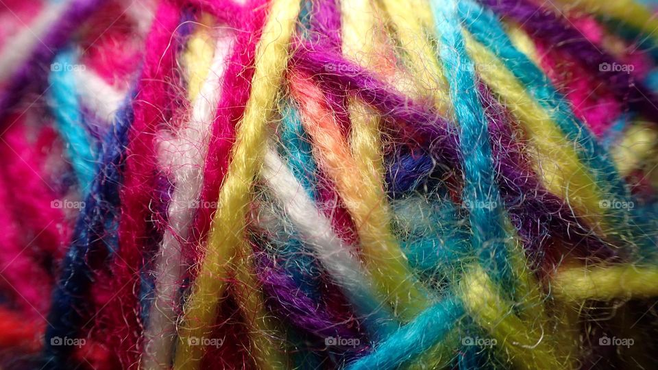 Closeup colorful ball of yarn cat toy