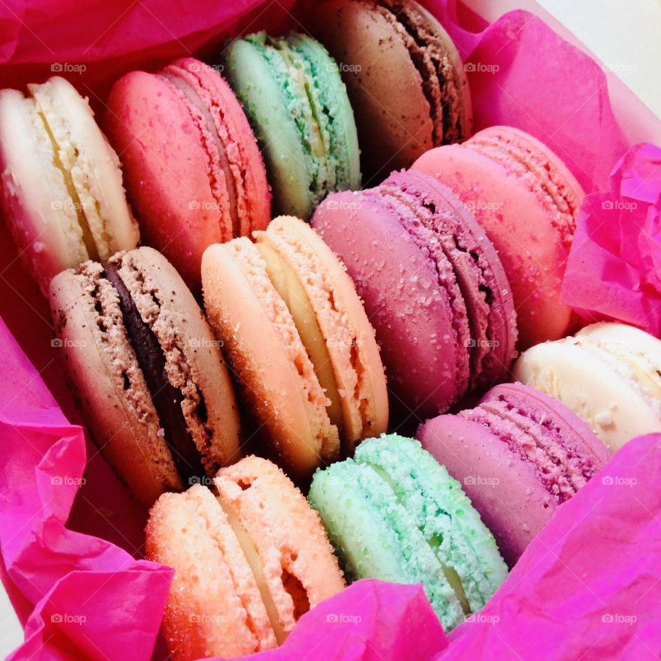 multi-colored macaroons in a box