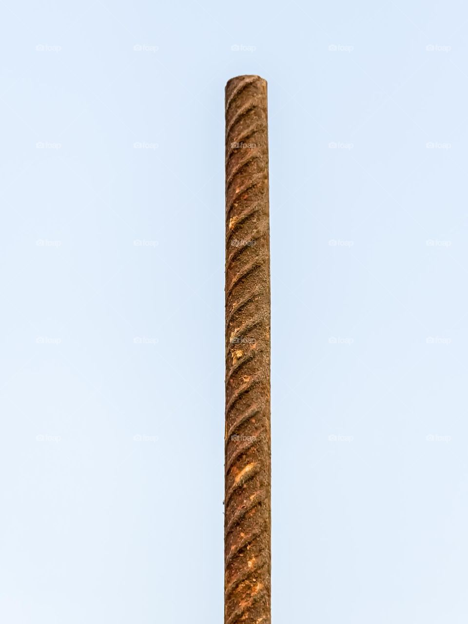 iron rod with heavy rust on it