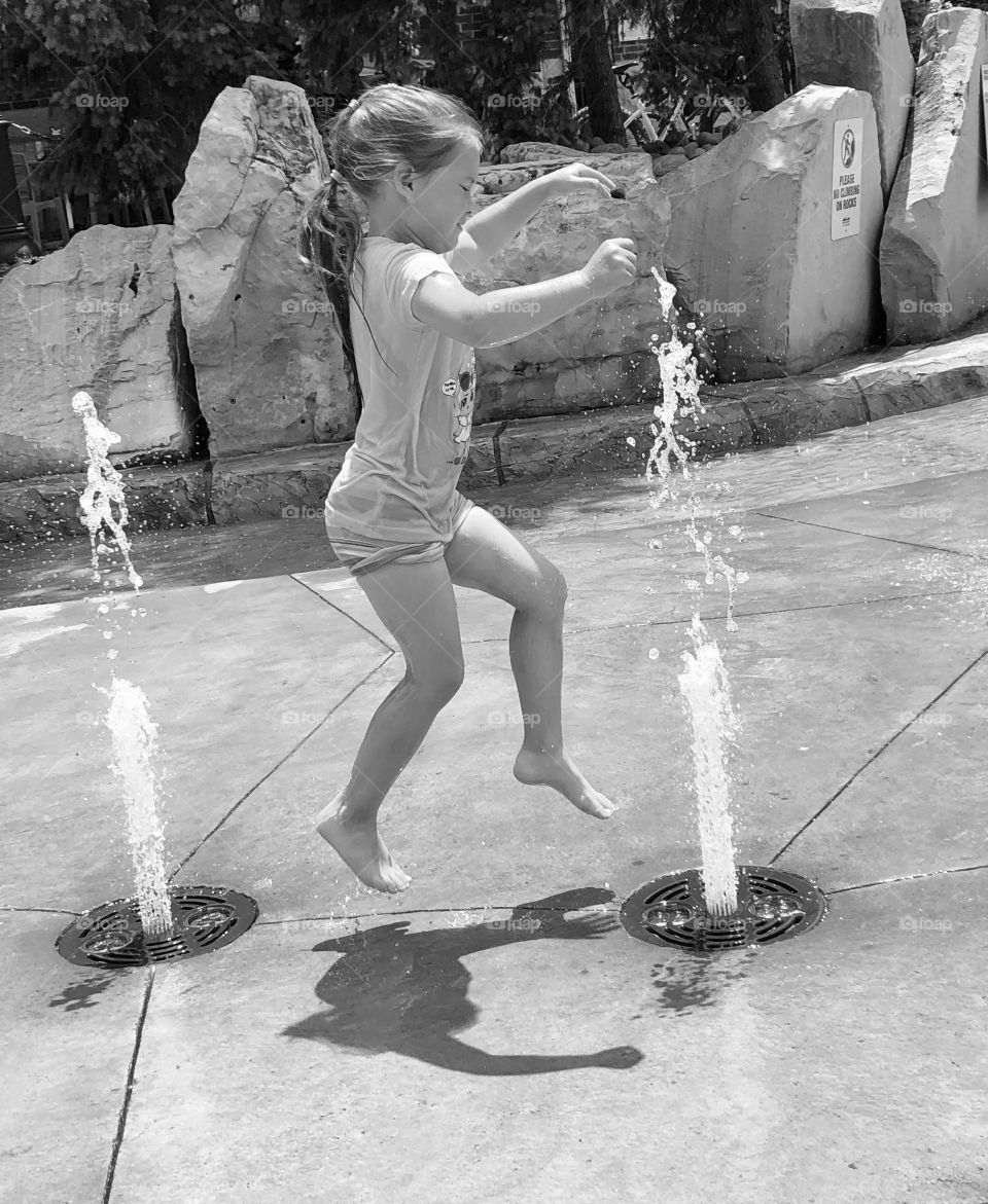 Running Through Sprinklers At The Water Park!