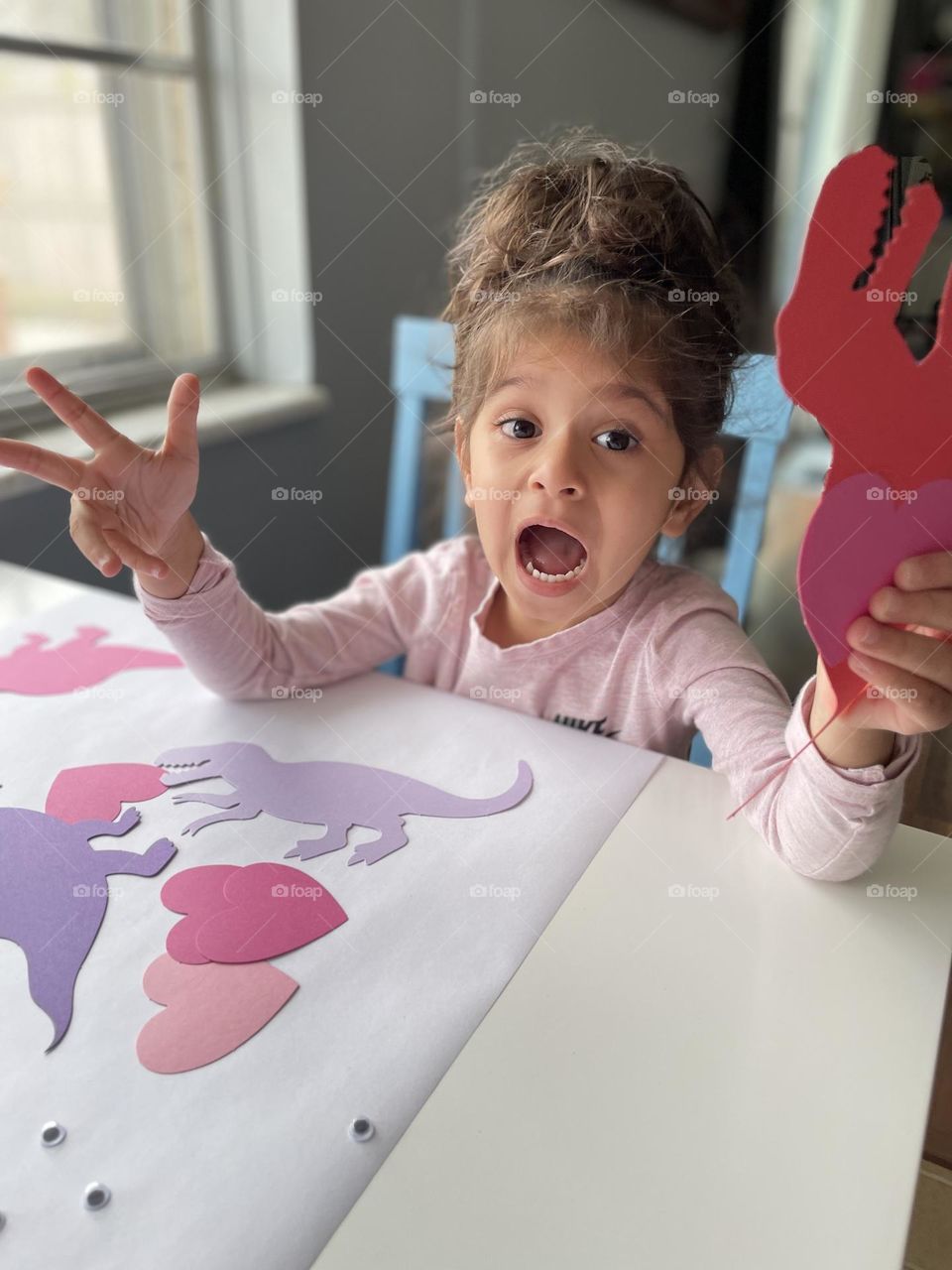 Excited about making valentines, little girl makes valentines with mommy, mommy and me time, making dinosaur themed valentines, toddler crafts 