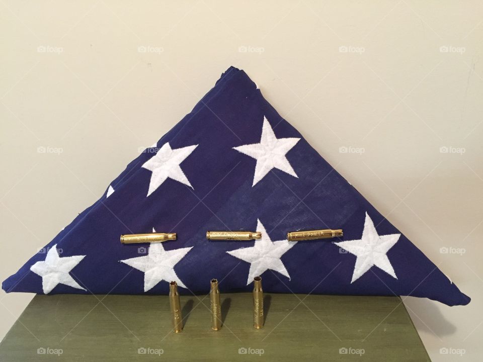 American flag folding a triangle for a Vietnam vet