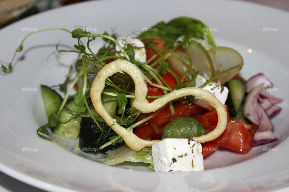 Love Salad. fresh restaurant salad with heart