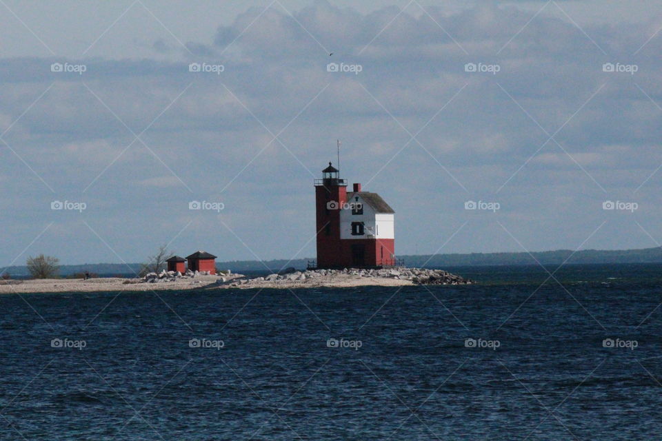 Lighthouse island by Mackinac Island. Lighthouse island by Mackinac Island