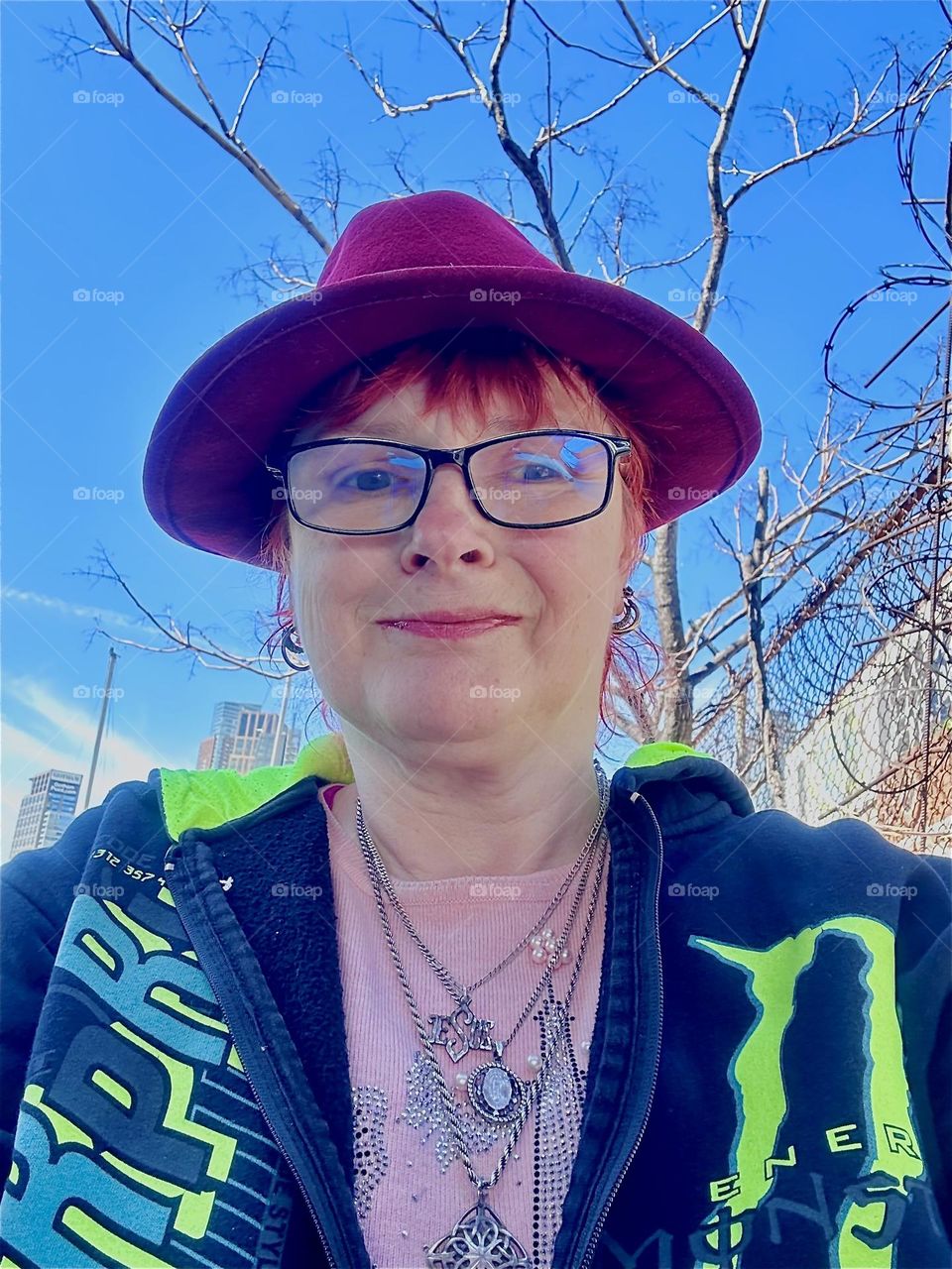 This is me, “Petra Schiller” a.k.a. “Maxine Firefox” standing in the parking lot beneath the “Pulaski Bridge” at “Newtown Creek” in LIC, Queens by the wall we walk along to get to our boat “Salvation”. 2024. Hypnotic Productions