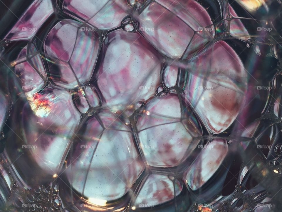 I don't know how to describe this photo. 
I'll just write "water", "oil", "bubbles".