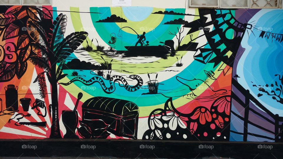 Artes de rua. Grafite, pinturas artísticas em muros, paredes das cidades em pontos turísticos. Tema; natureza.