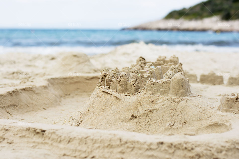 sand castle on a beach. sand castle on empty beach