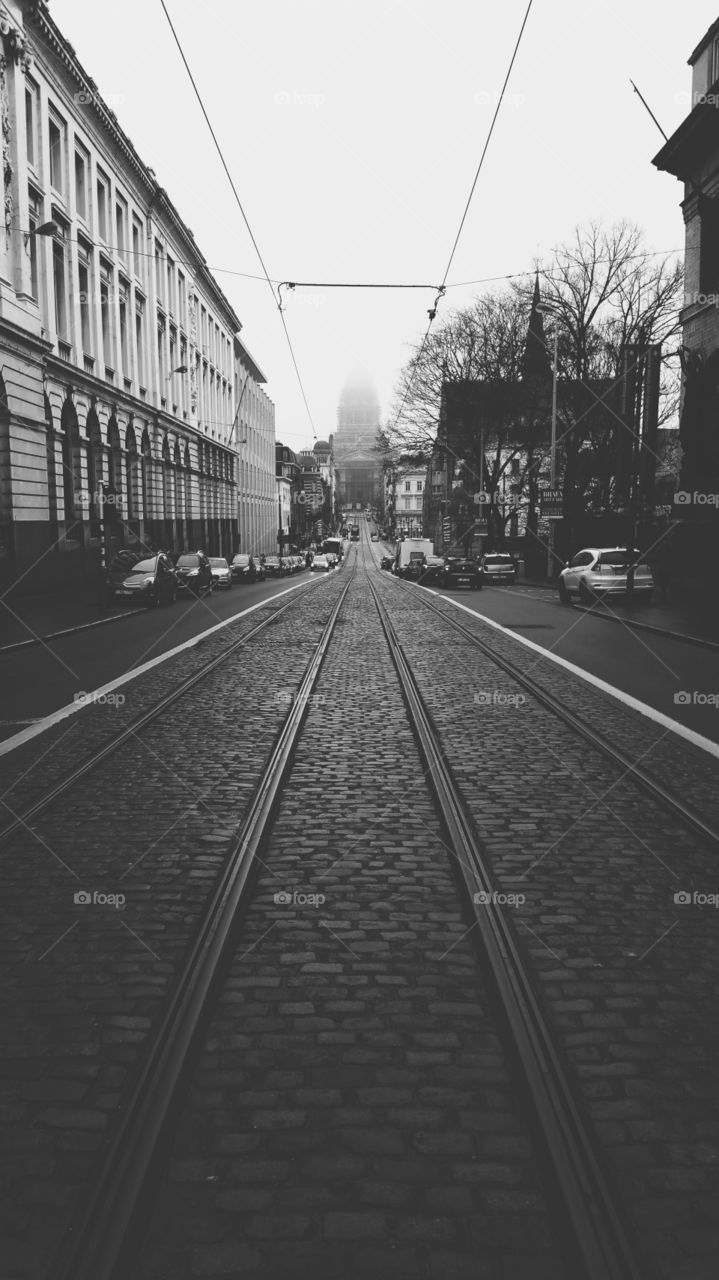 Middle of a street tram line in Central Brussels Belgium