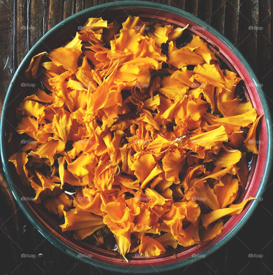 Marigold petals in a bowl!