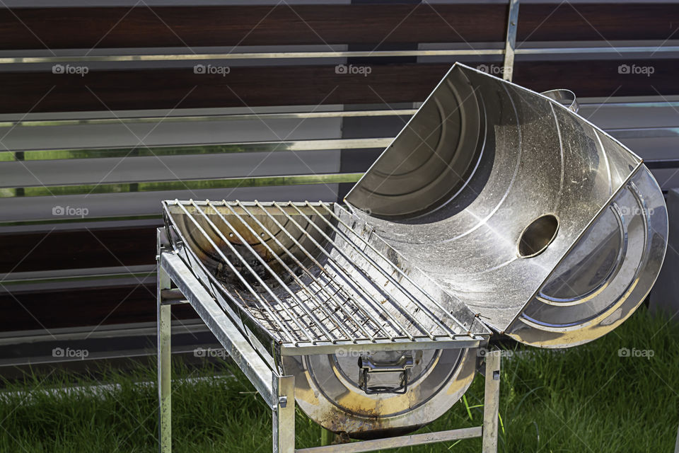 The Grill made of stainless tanks in park.