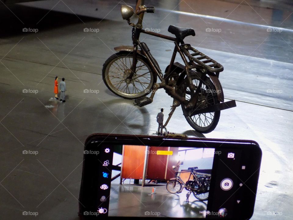 An object of taking photo stories about old bicycle toys and people, very similar to the world of liliput