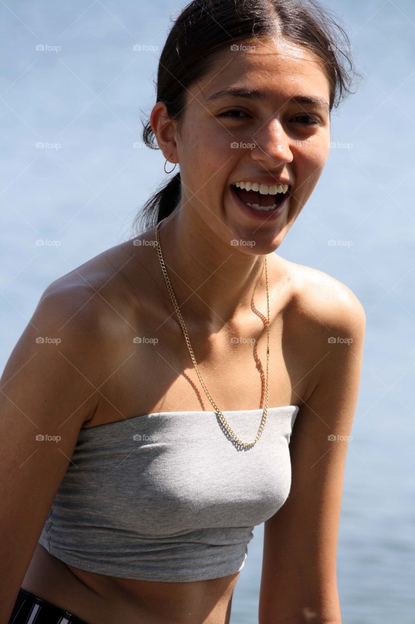 Teen girl laughing