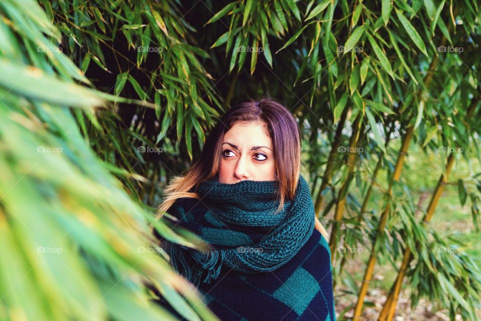 Close-up of woman wearing muffler