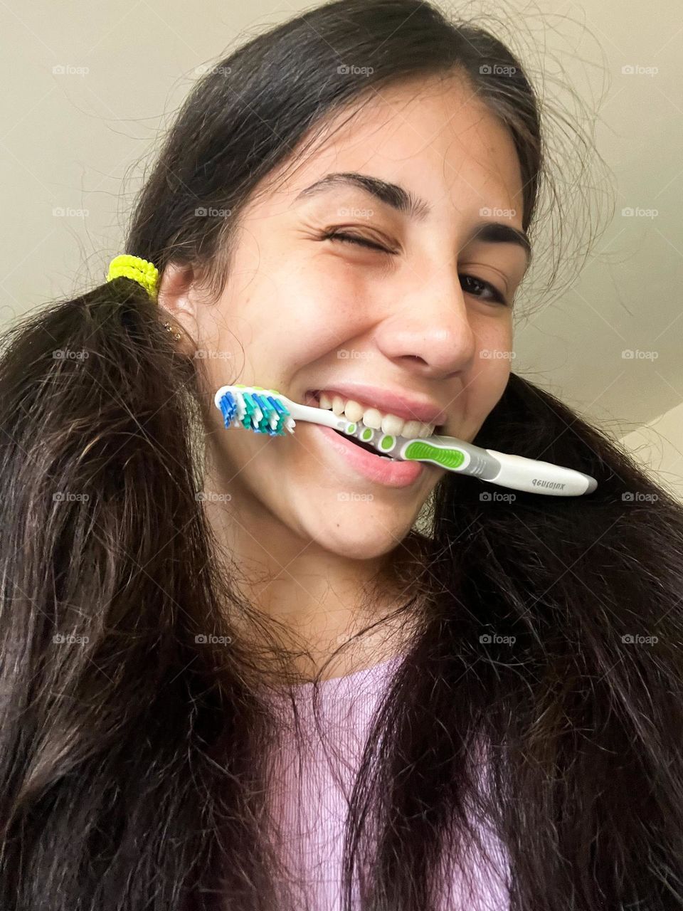 Energetic, Vibrant Portrait of Girl with Toothbrush