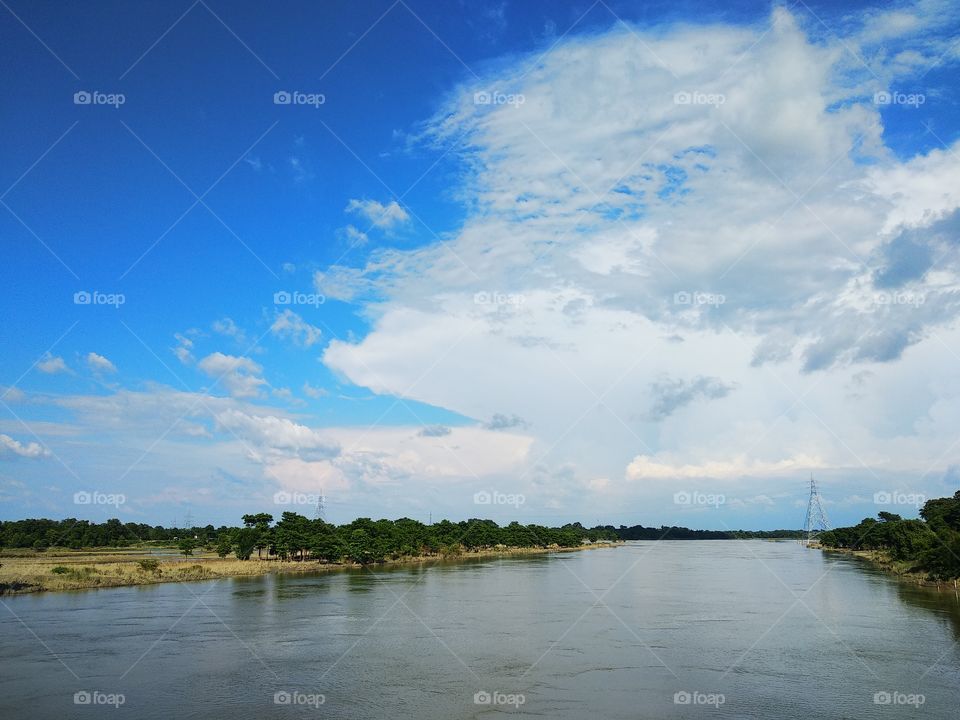 landscape beauty with river sky cloud water and beach in bihar.