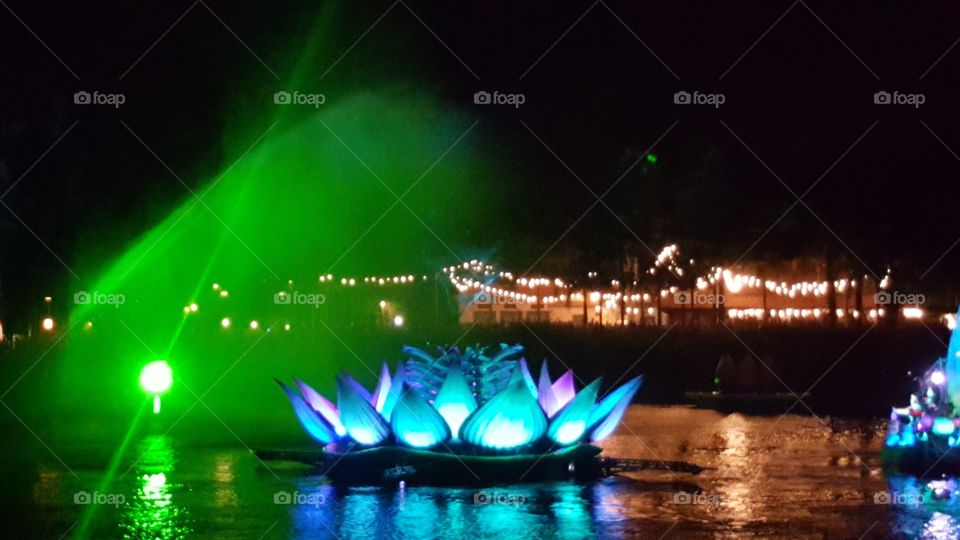 The brilliant colors resonate over the waters of Discovery River during Rivers of Light at Animal Kingdom at the Walt Disney World Resort in Orlando, Florida.