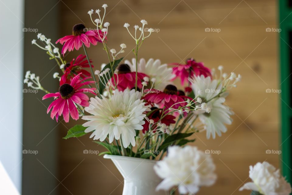 Pink and white flowers in a vase