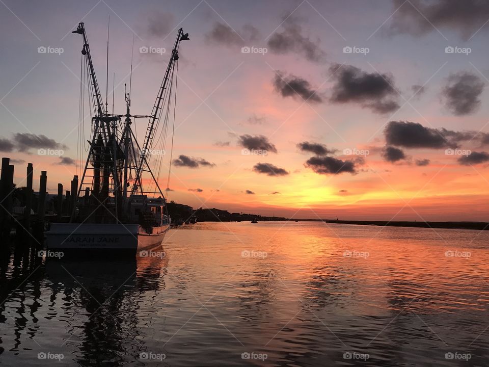 Shrimp boat at sunset