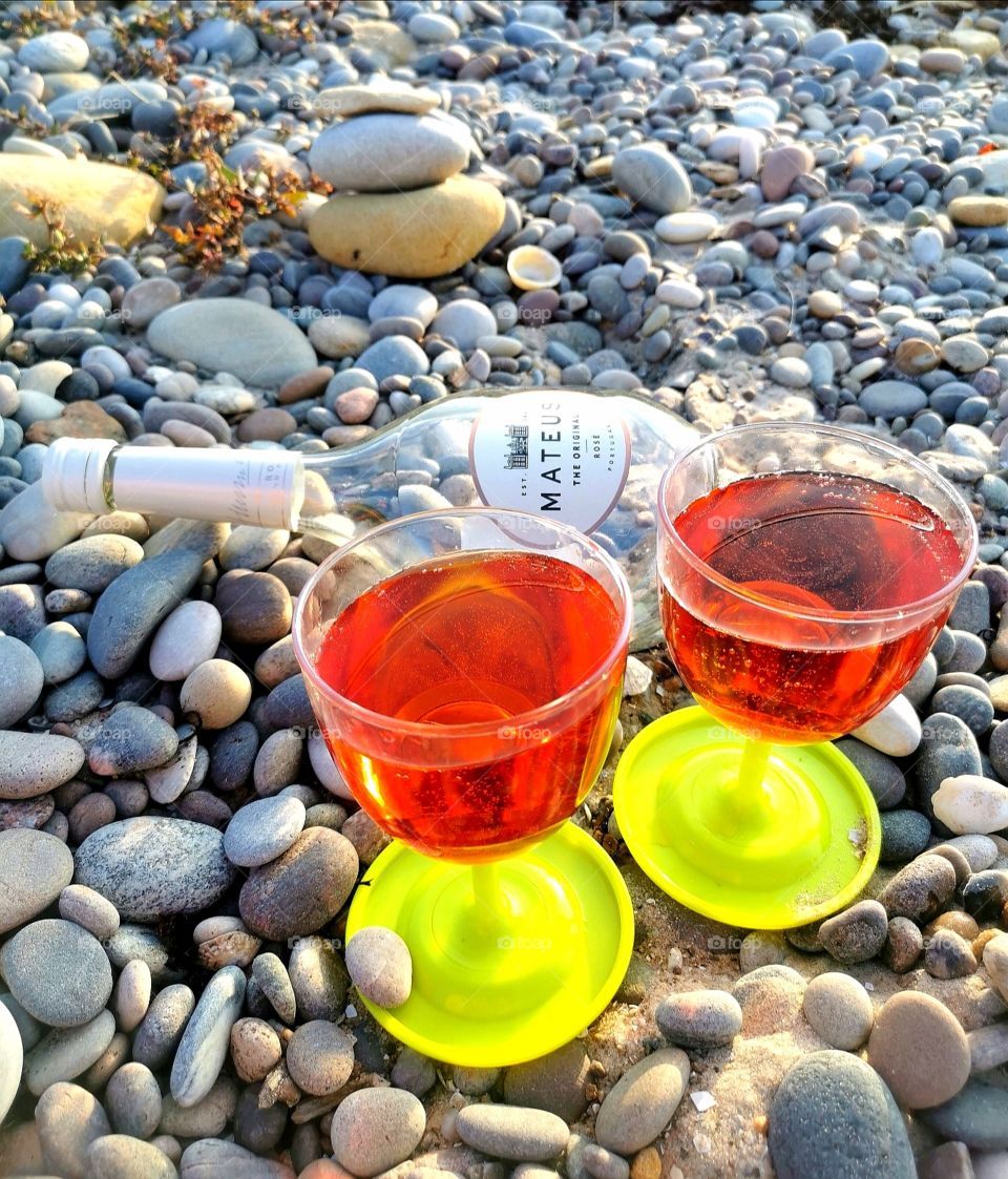 Wine on a pebbled beach