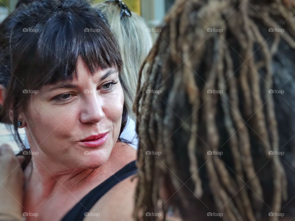 Close-up of mature woman in fringe hairstyle