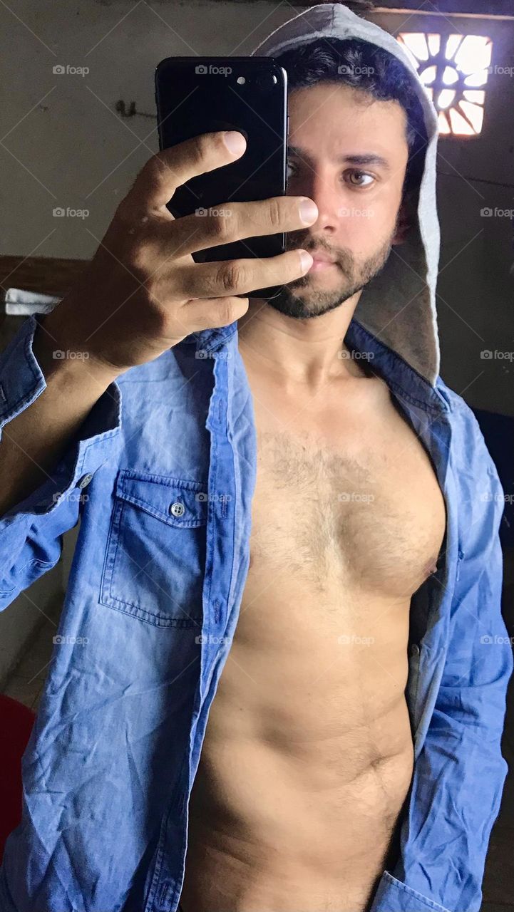 Selfie photo of handsome man in mirror