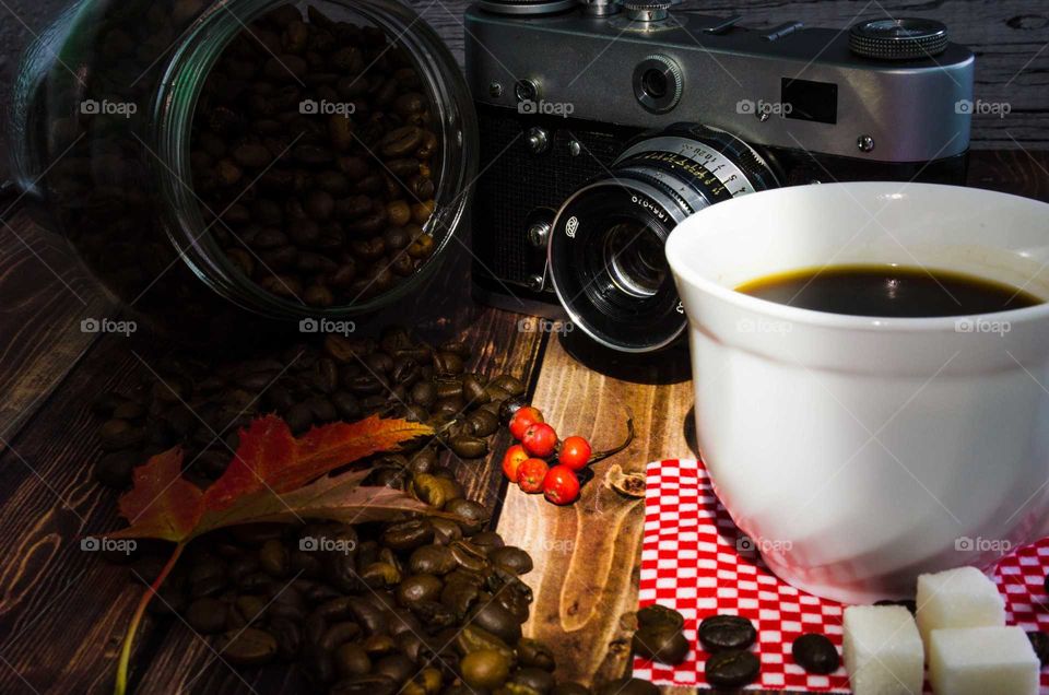 coffee been still life on wooden background