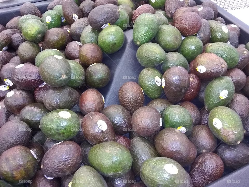 Tropical fruit
avacado, tropical pear, green. has a seed
high in fat, healthy ,makes  gucamoly
