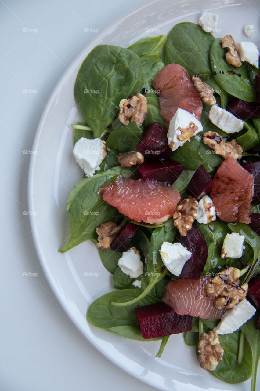 Grapefruit beetroot goat cheese and walnut salad