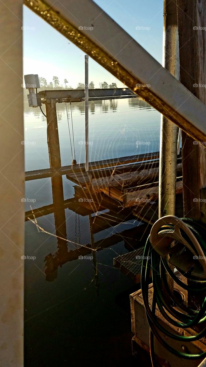 not in use.  spiderweb on boat lift over looking the lake.