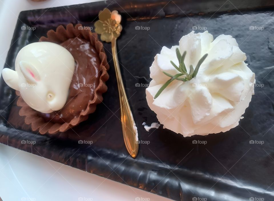 rabbit sugar on brownie with a whipping cream