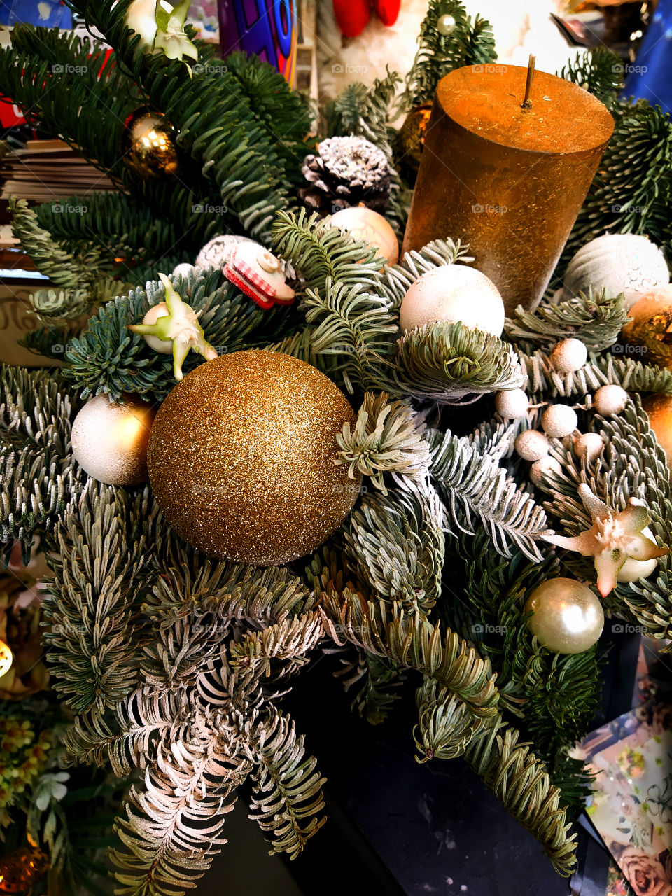 Christmas wreath of flowers and candle