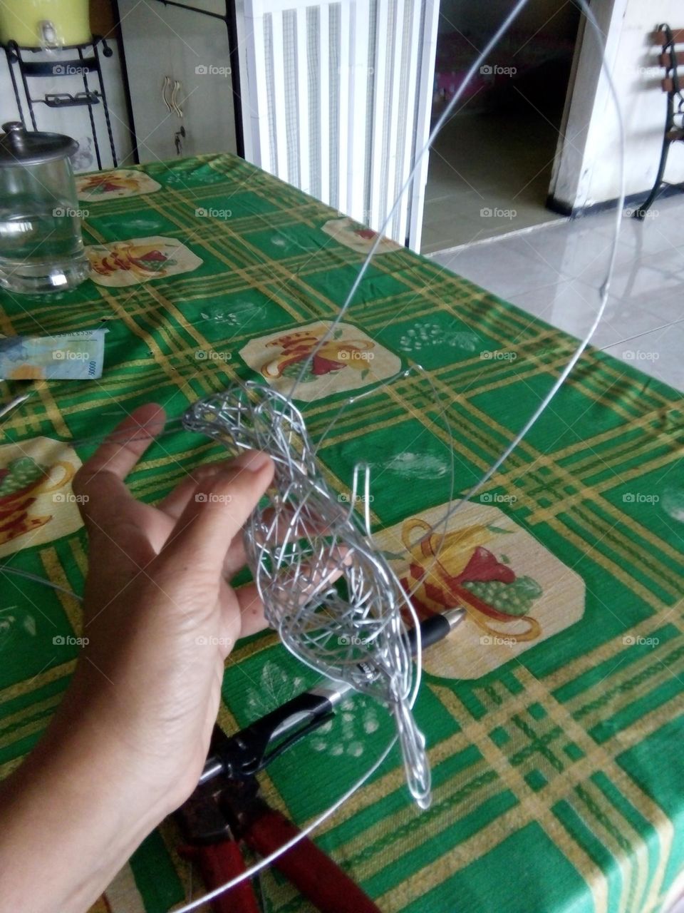 make a bird statue from stainless wire