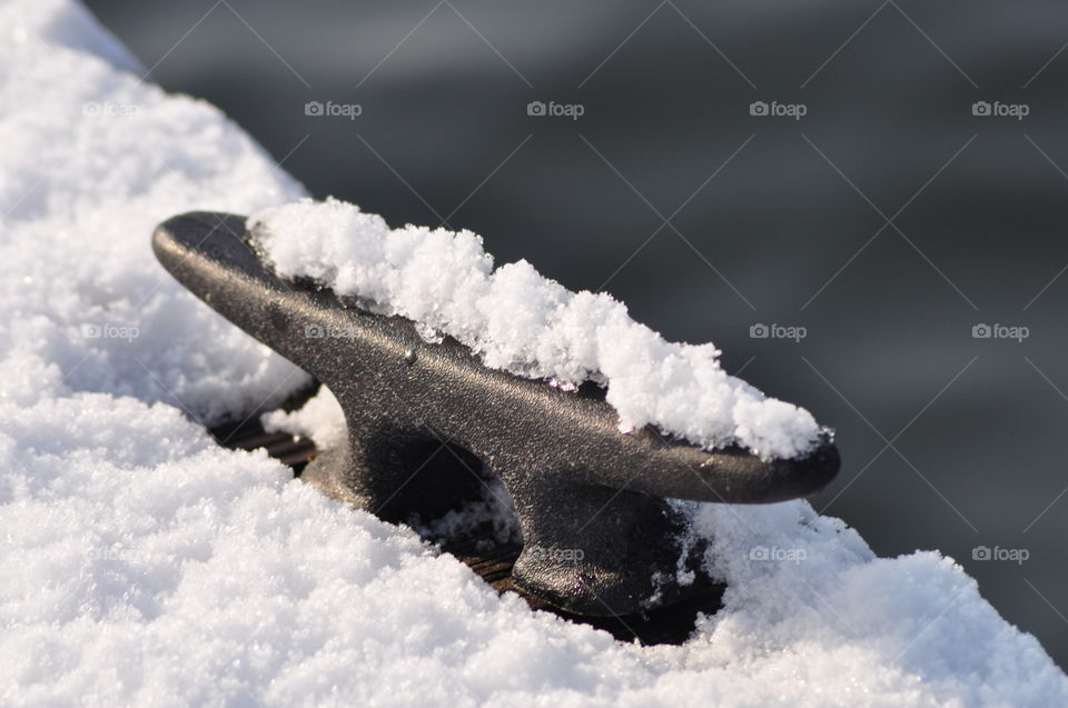 Close-up of metallic object in winter