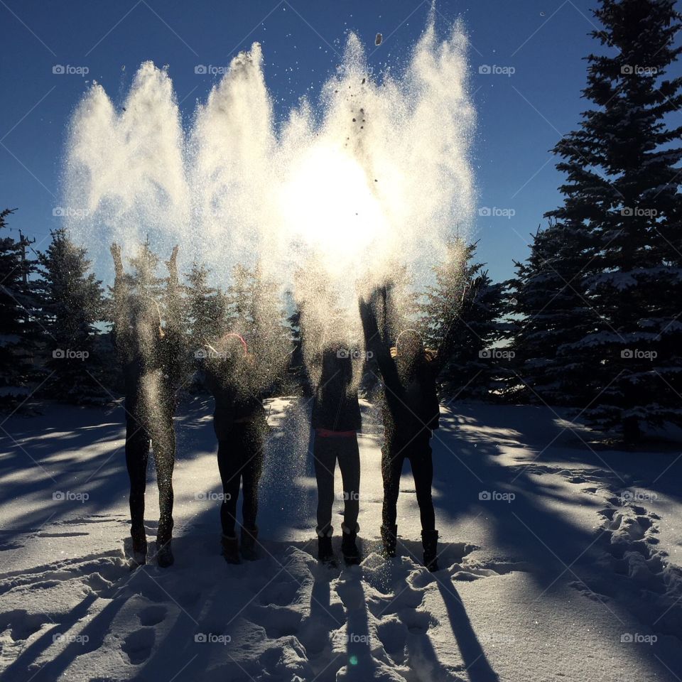 It's snowing!. My daughter and her friends playing in the snow. 