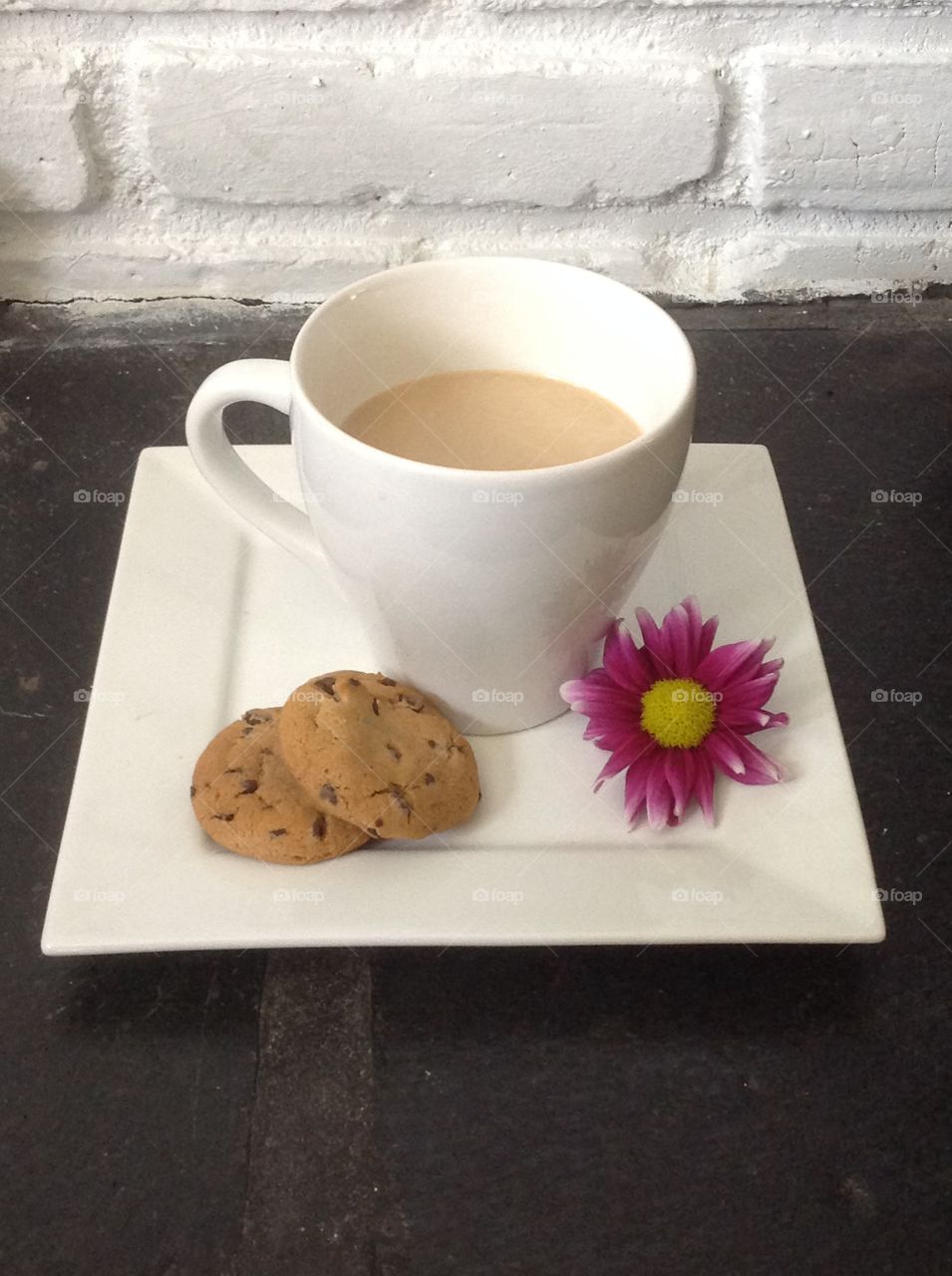 Enjoying a cup of coffee outdoors on a beautiful spring day.