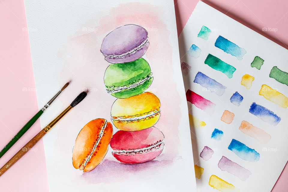 Color clash. Watercolor painting of macarons.