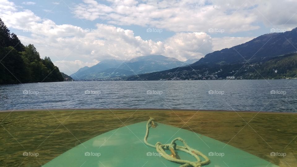 View from boat on Lake with mountains