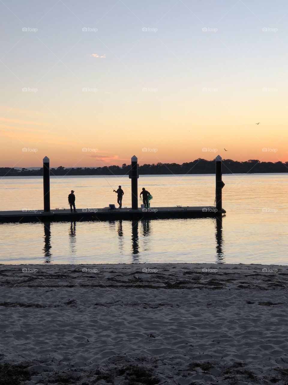 Fishing at sunset