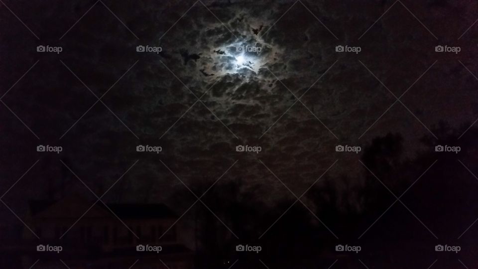 Moon through the clouds