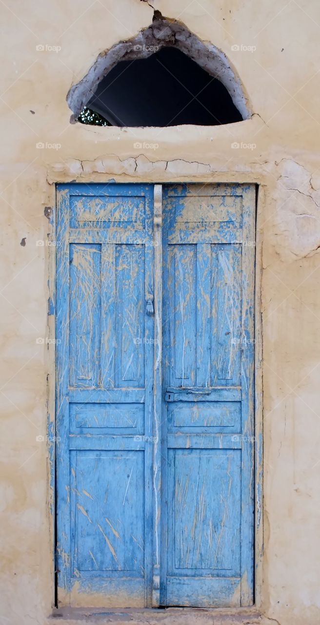 Nubian village door . Blue painted wooden door in Nubian village Aswan Egypt 