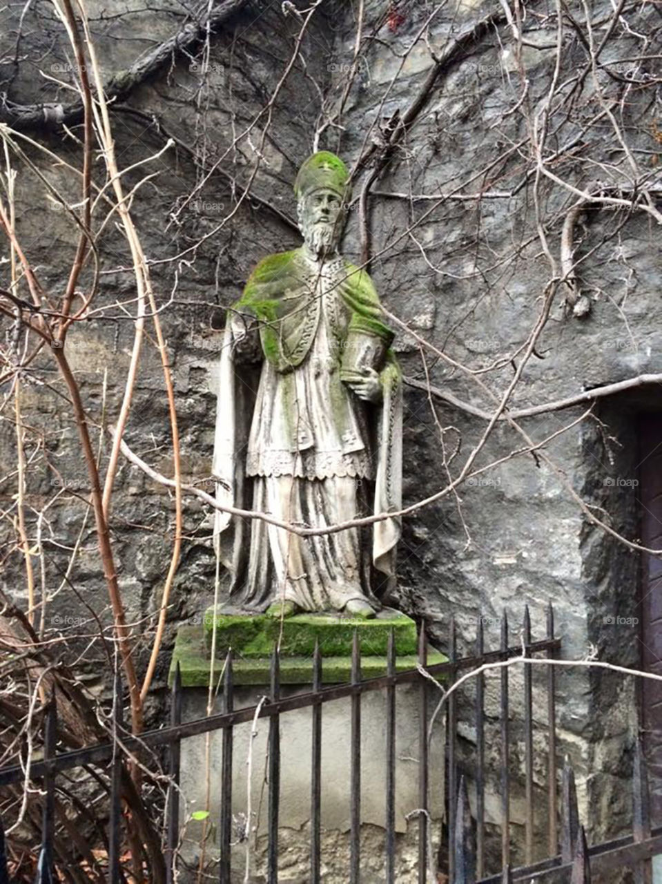 Statue outside old church in Vienna Austria 